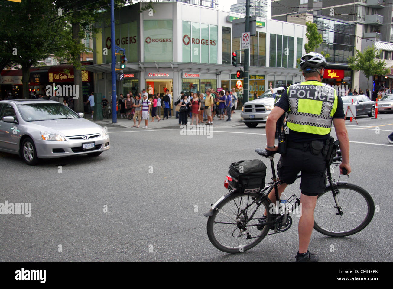 Vancouver police on traffic duty, Vancouver, Canada Stock Photo