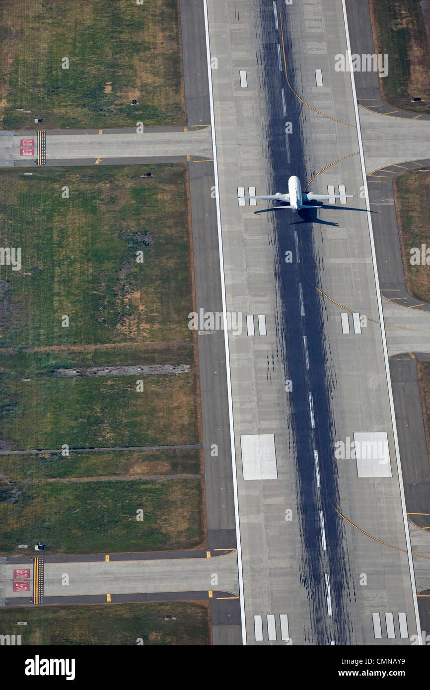aerial photograph of jet landing at Minetta San Jose International Airport, SJO, Santa Clara county, California Stock Photo