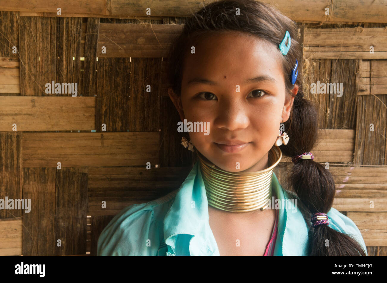 a young Padaung (Longneck Karen) girl in her village of Ban Nai Soi in northern Thailand Stock Photo