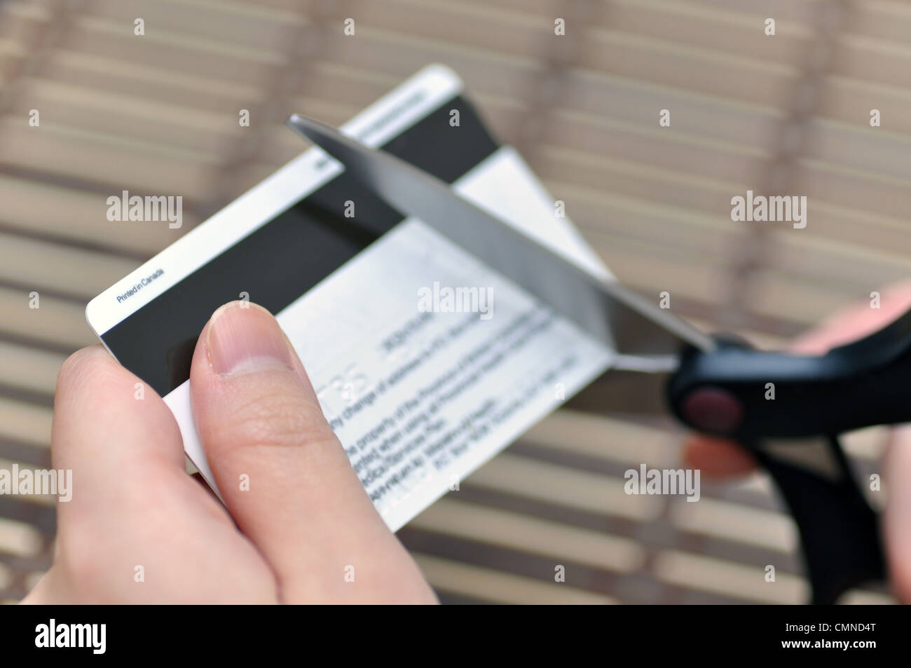 Cutting credit card Stock Photo Alamy