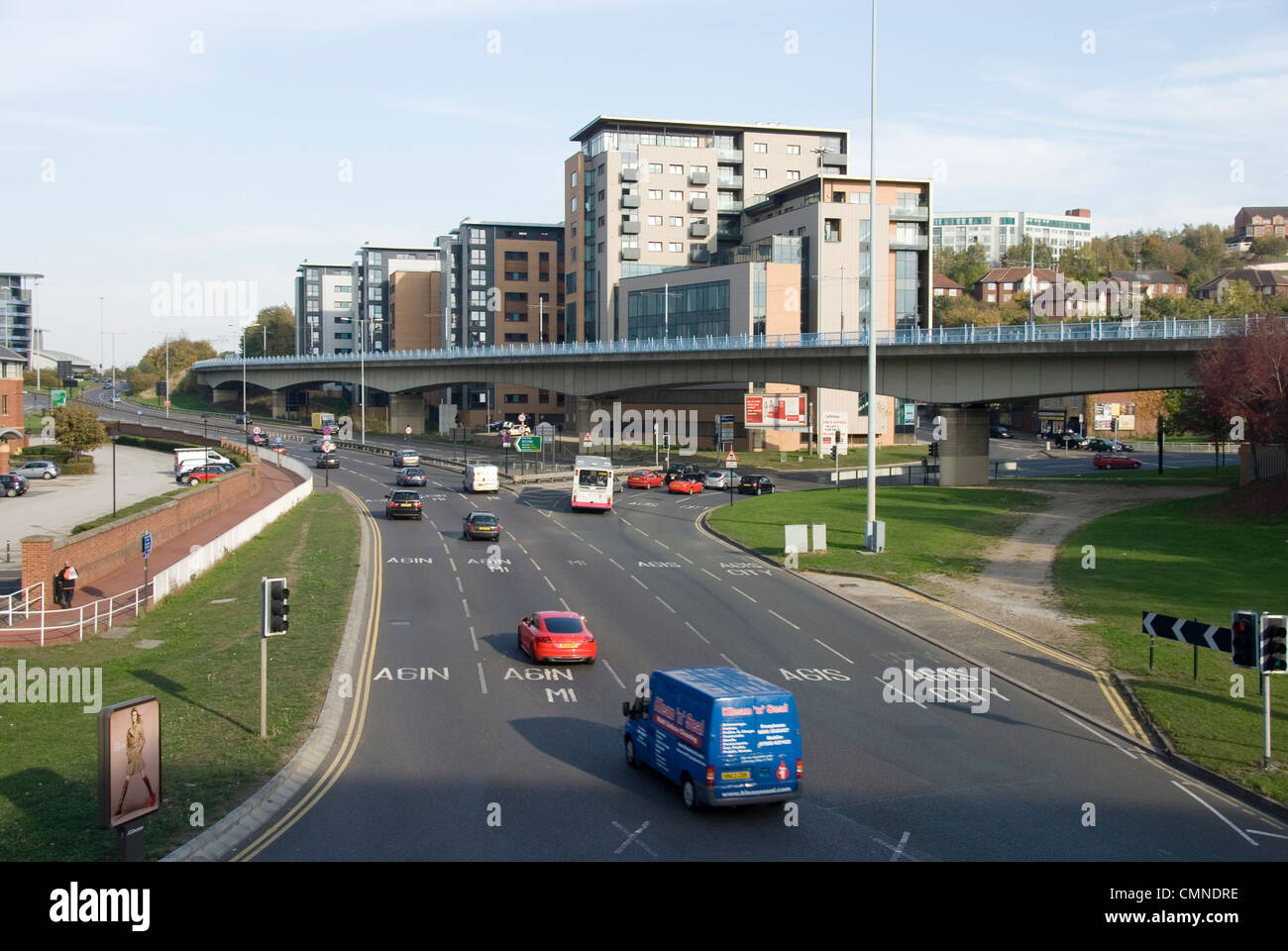 Light Commercial Traffic on A61 Junction 2 heading towards M1 Motorway at Park Square Roundabout on a Sunny Day, Sheffield, UK Stock Photo