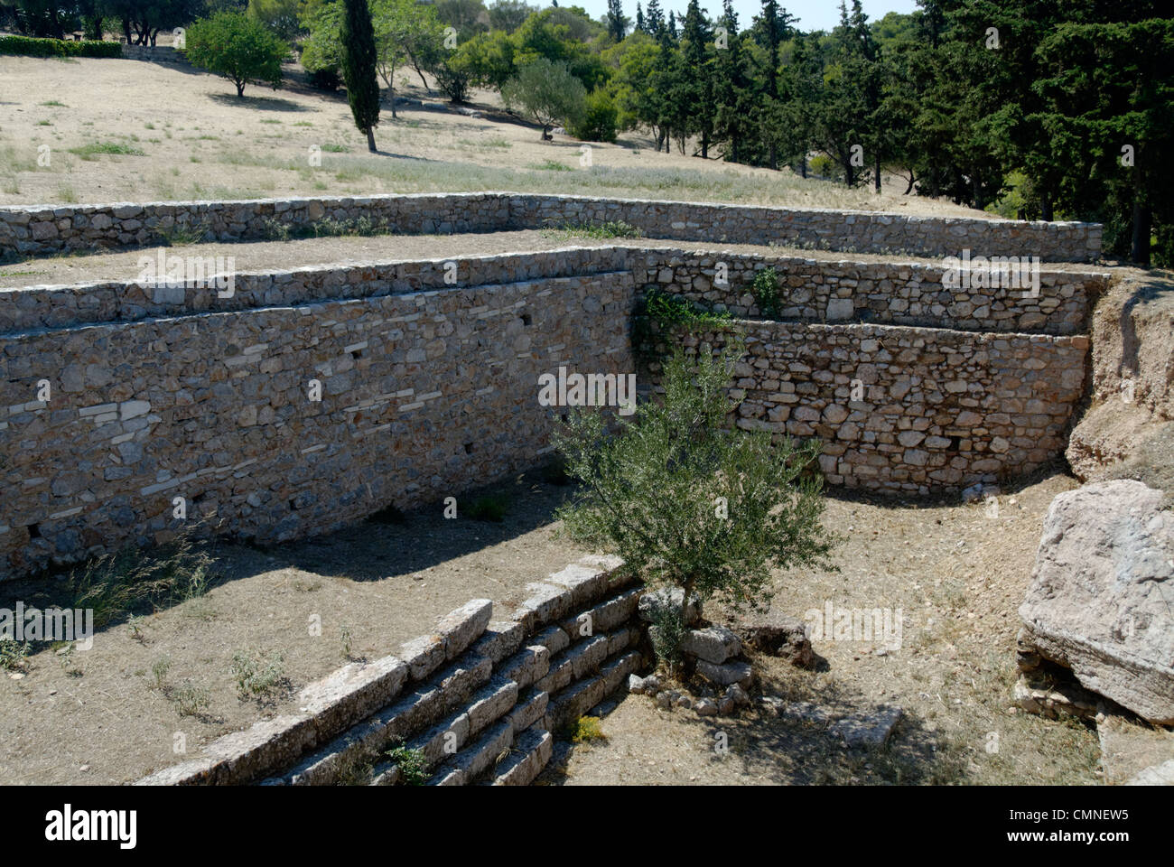 Pnyx Hill. Athens. Greece. View on Pynx Hill of the retaining wall with flight of steps that led to the terrace where speakers Stock Photo
