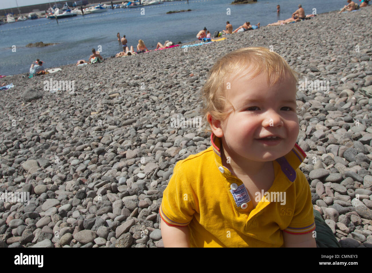 Puerto de las Nieves Beach just before his first birthday. Stock Photo