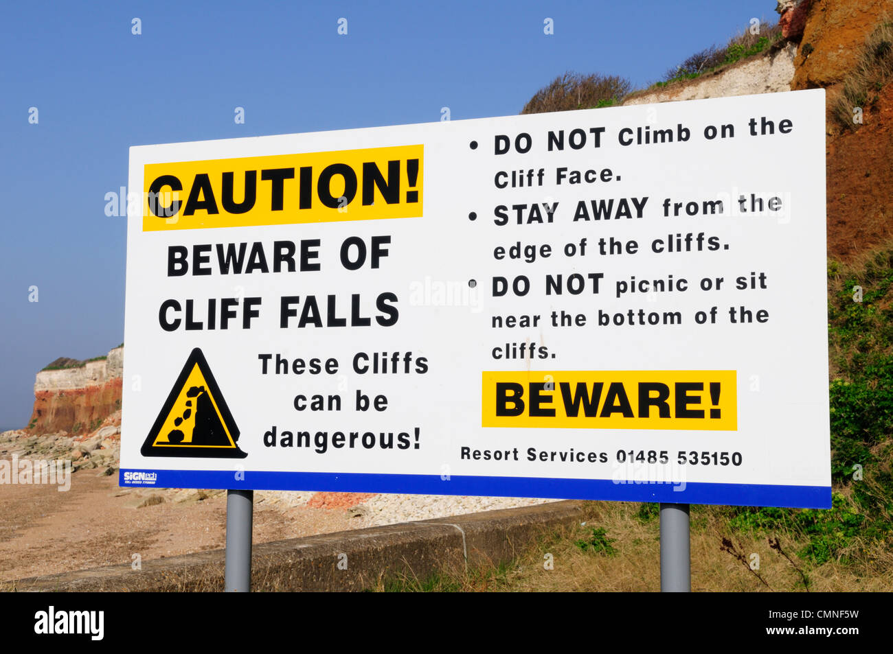 Beware of Cliff Falls Warning Sign, Hunstanton, Norfolk, England, UK Stock Photo