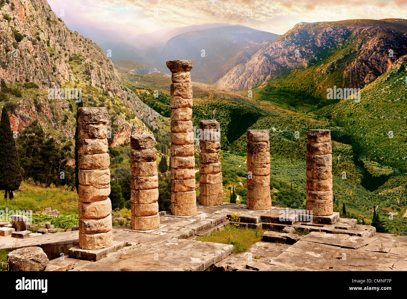 The ruins of the 4th century BC Temple of Apollo , a peripteral Doric building. Delphi, archaeological site, Greece, Stock Photo