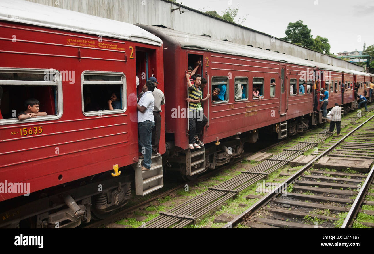 crowded train travel near Kandy, Sri Lanka Stock Photo