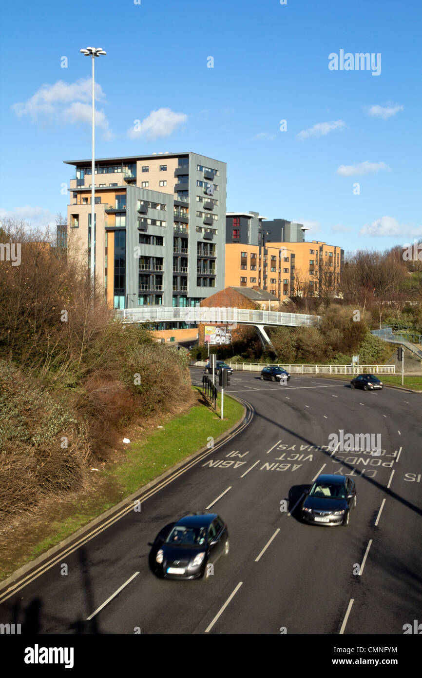 cars driving down multi lane carriageway in Sheffield city center with