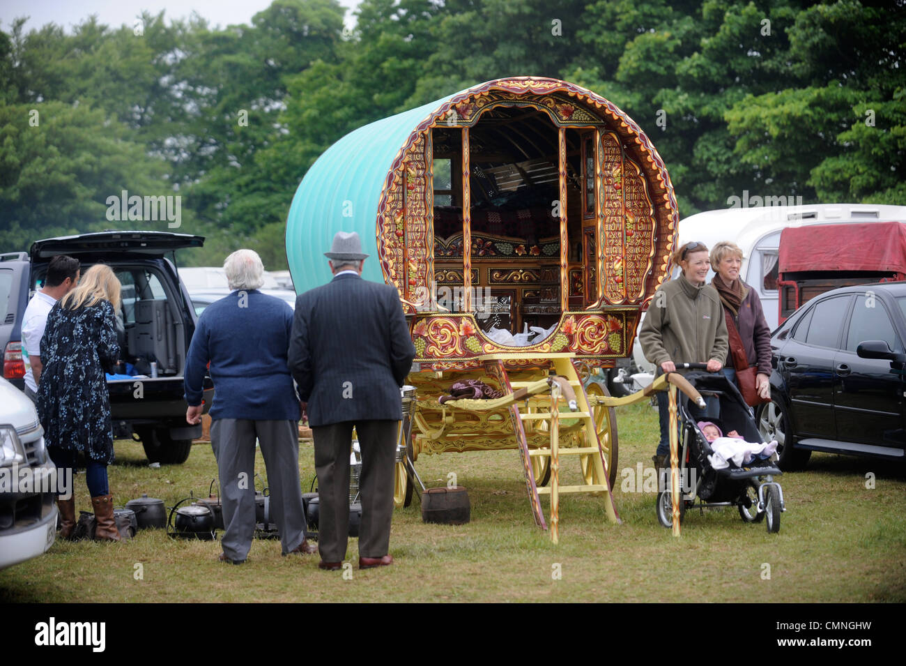 A highly decorative horse drawn caravan or Gypsy wagon at the Stow-on-the-Wold horse fair May 2009 UK Stock Photo
