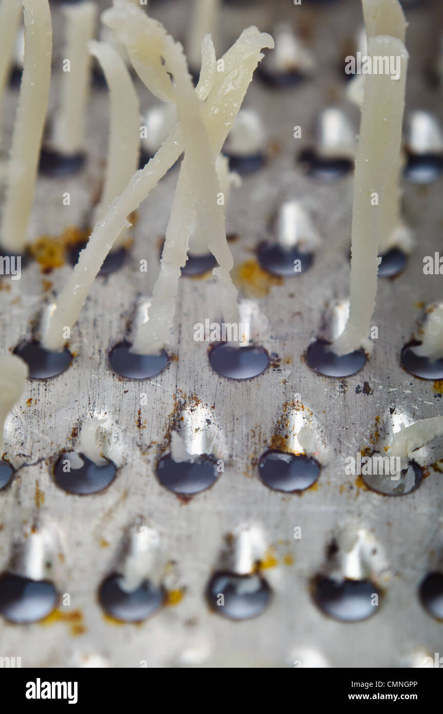 Closeup of rusty grater with upright cheese threads Stock Photo Alamy