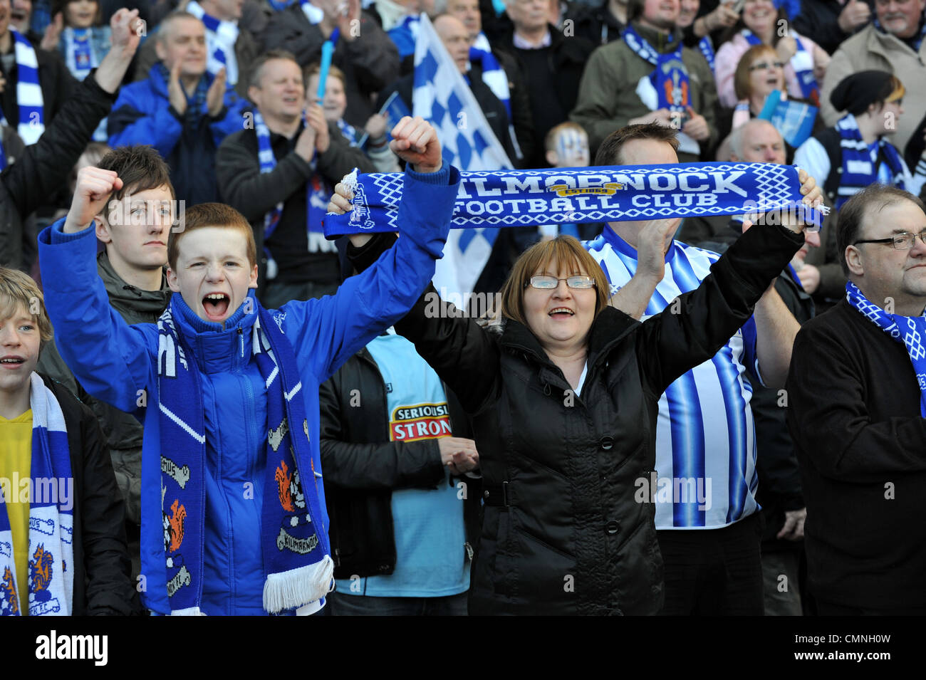 Kilmarnock fans celebrate victory over Celtic in the Scottish Communities League Cup final at Hampden. Stock Photo