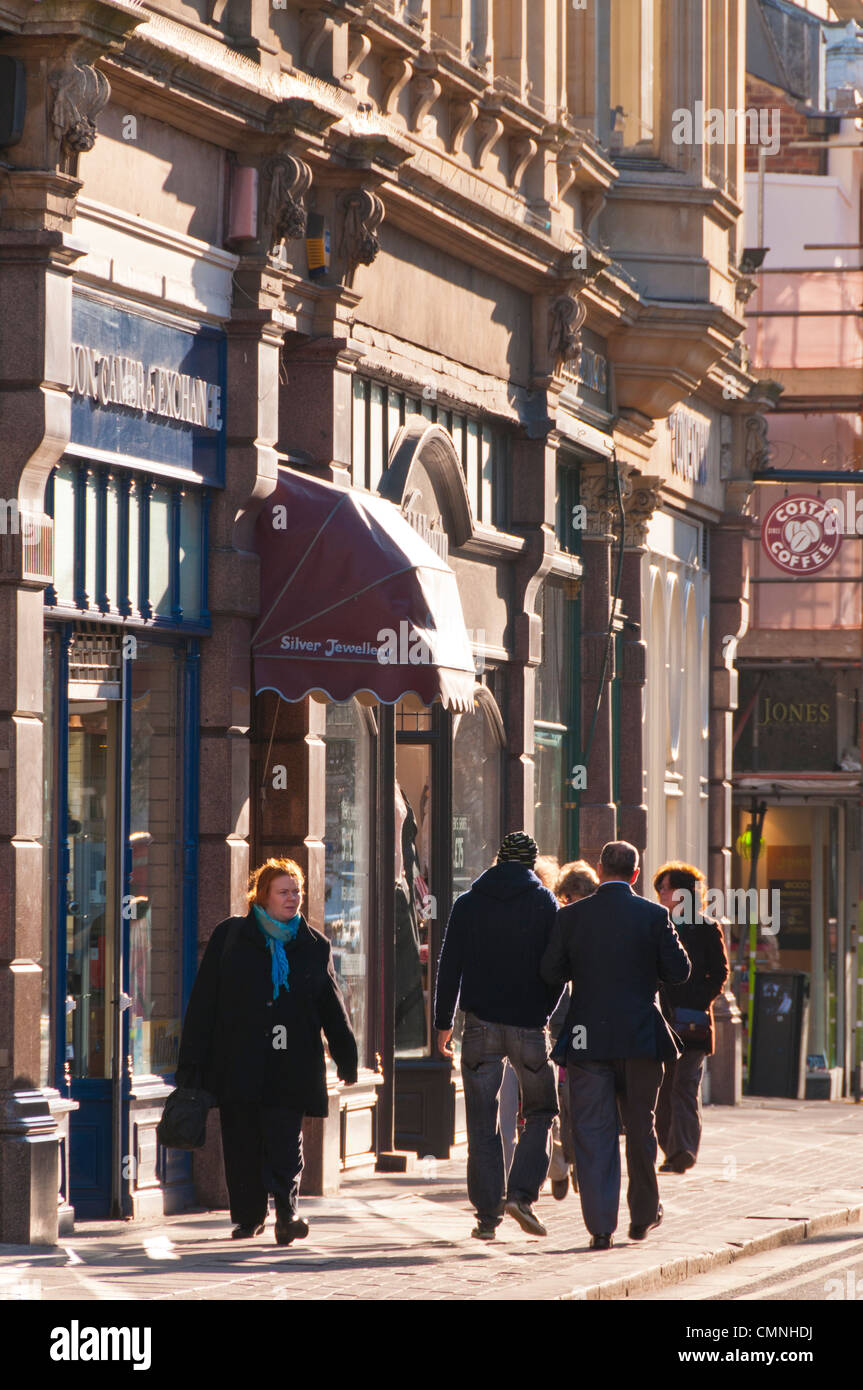 Pedestrians walking along the Promenade in Cheltenham, Gloucestershire