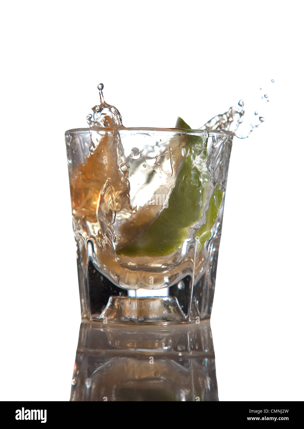 Tequila Splash with Motion and Lime Stock Photo Alamy