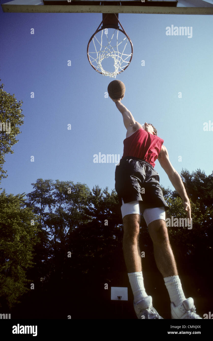 Men's outdoor basketball pickup game Stock Photo - Alamy