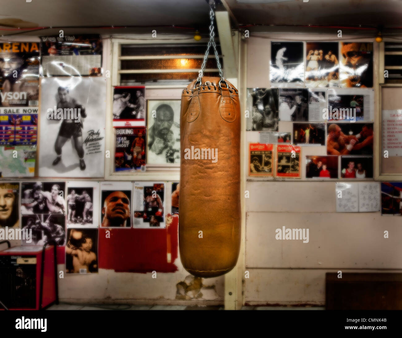 Punchbag in empty London boxing gym. Stock Photo