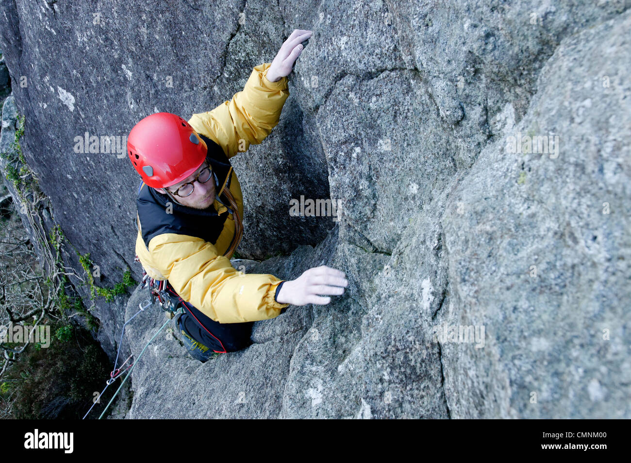 A rock climber leading a climb at Tremadog North Wales Stock Photo Alamy