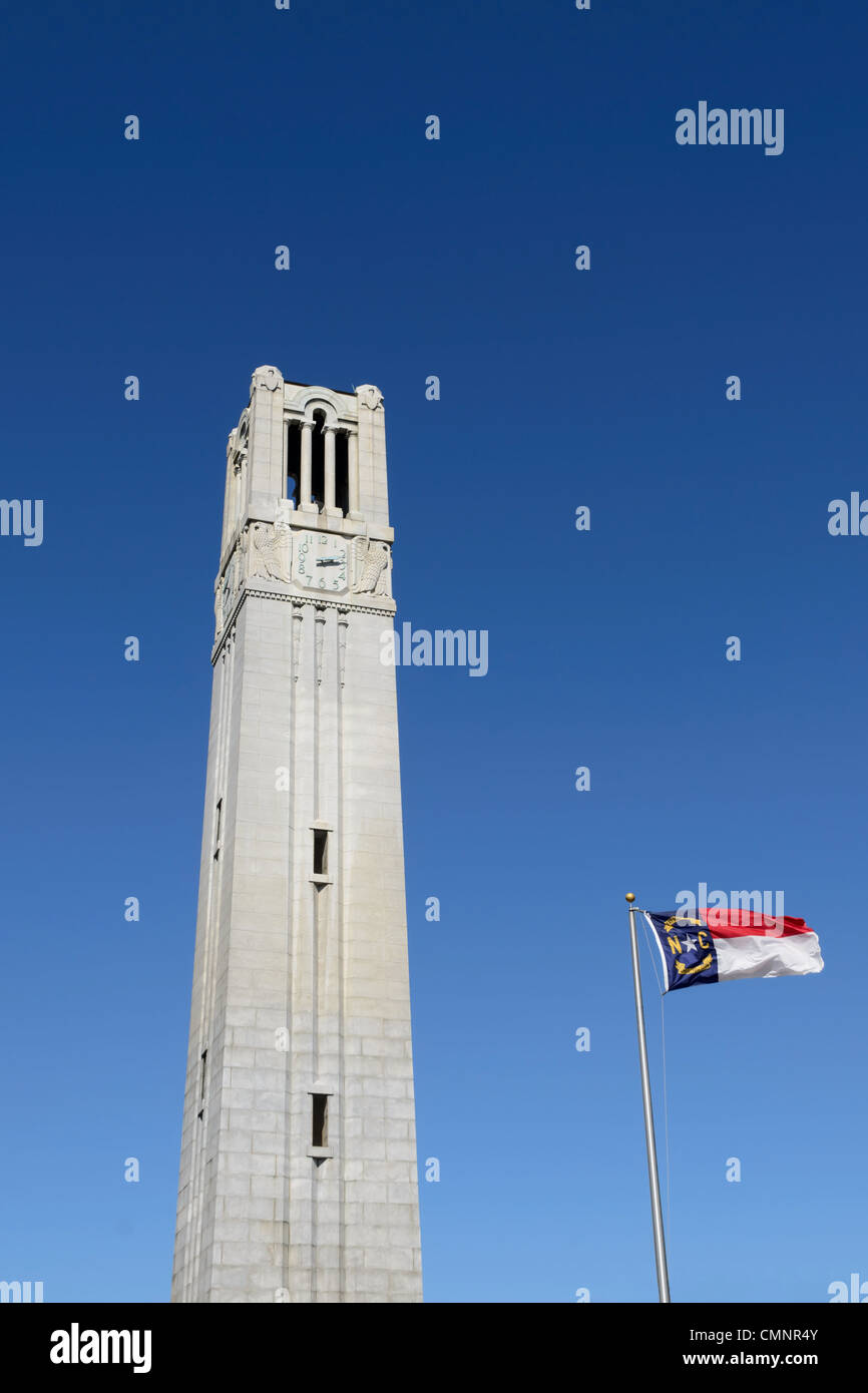 NC State University Bell Tower with flag in Raleigh, NC Stock Photo