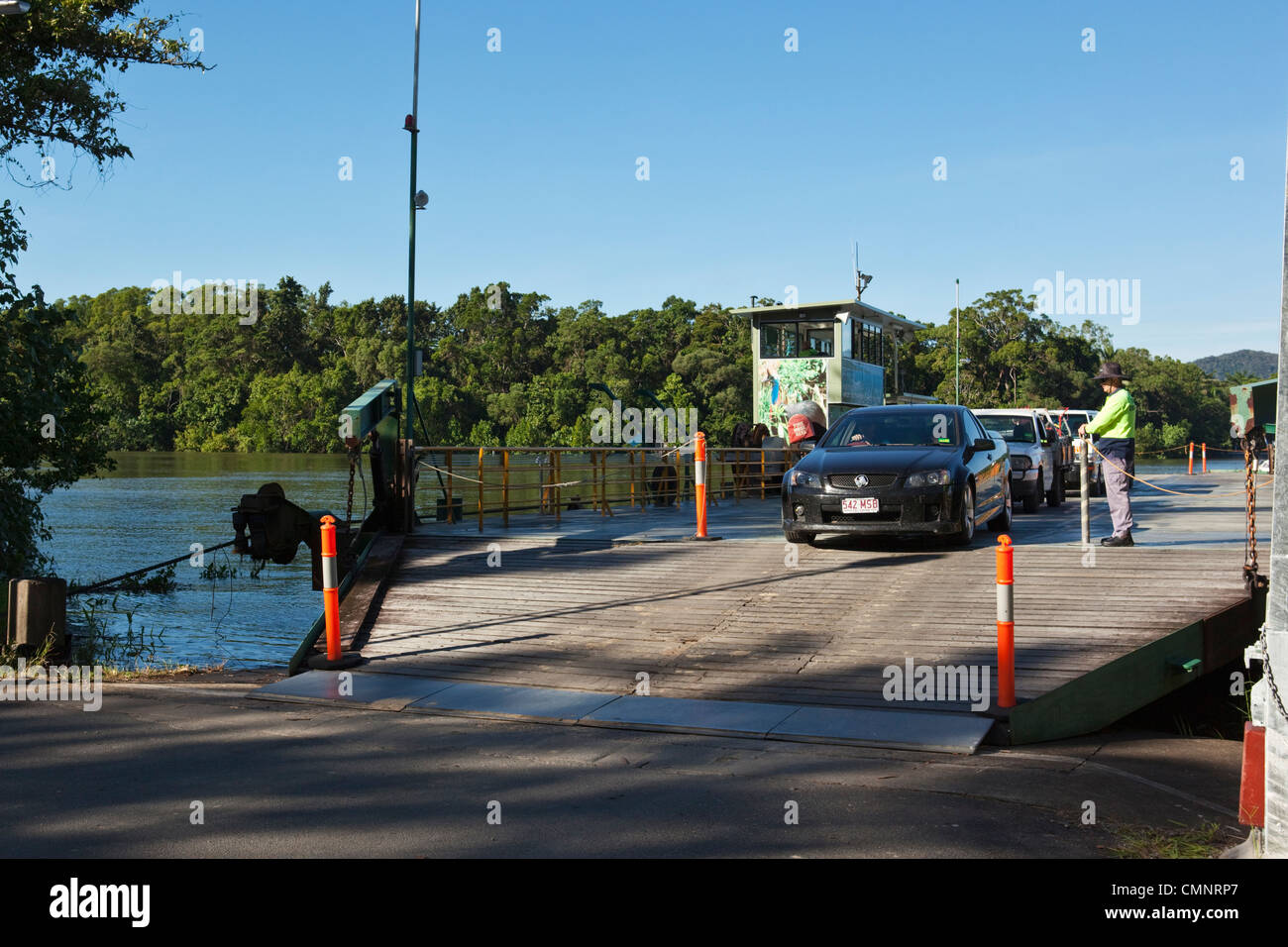 Cars disembarking from the Daintree River cable ferry. Daintree
