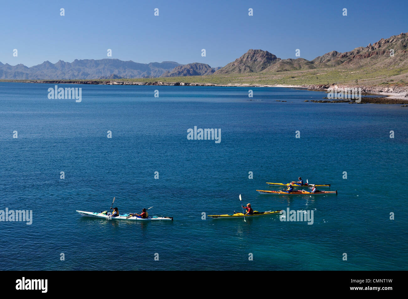 Sea kayaking along Isla Carmen in the Sea of Cortez, Loreto Bay National Park, Baja California, Mexico. Stock Photo