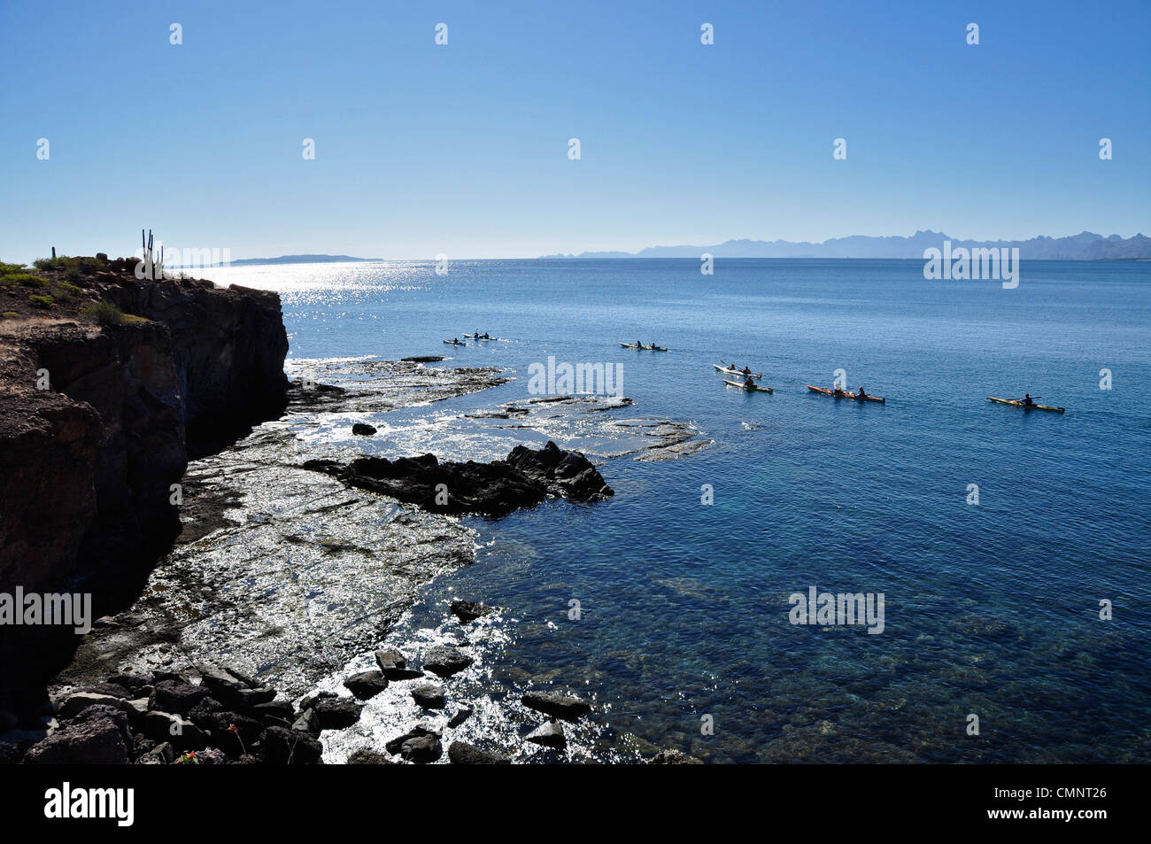 Sea kayaking along Isla Carmen in the Sea of Cortez, Loreto Bay National Park, Baja California, Mexico. Stock Photo