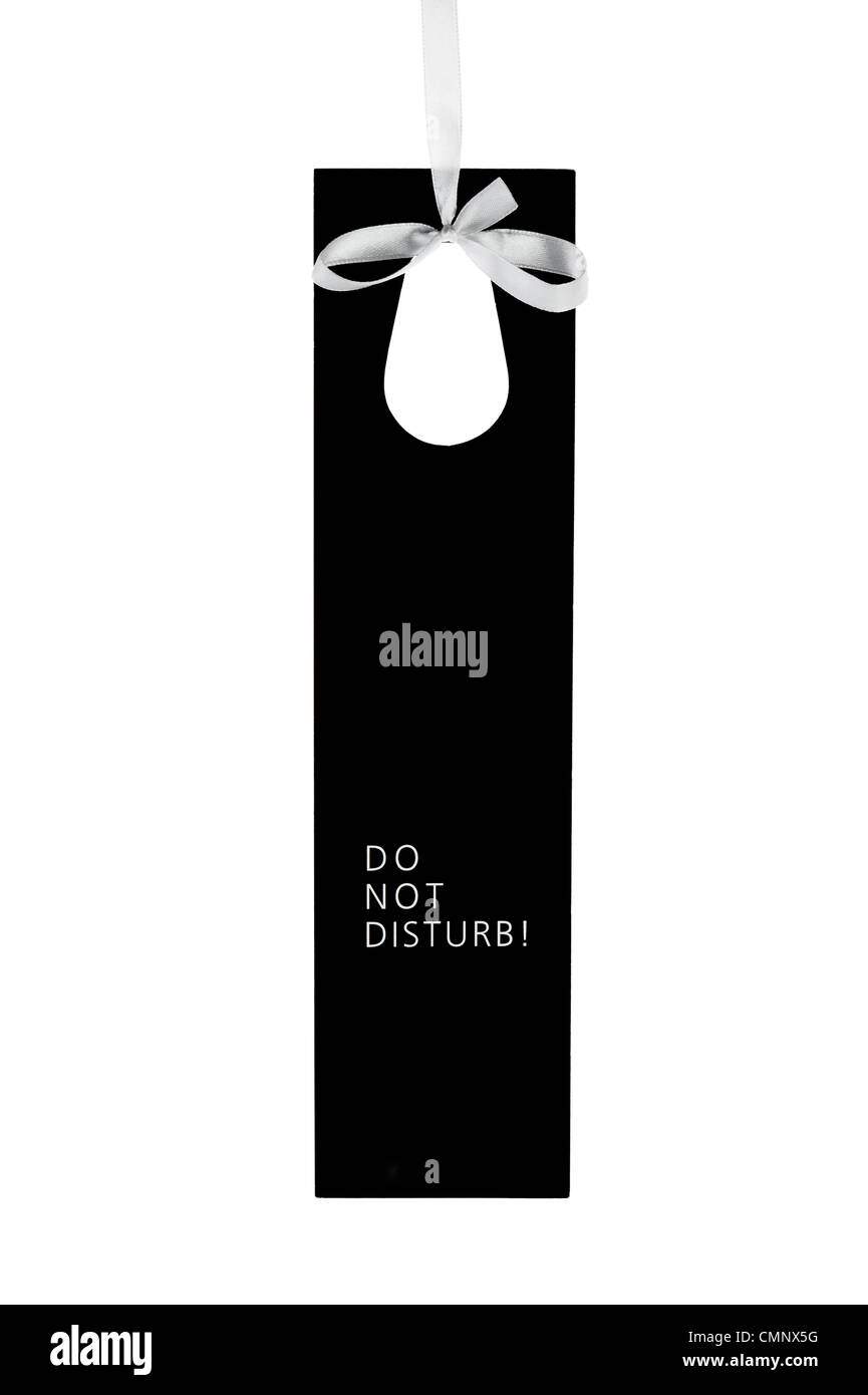 Do not disturb hotel door label on ribbon with text isolated on white Stock Photo