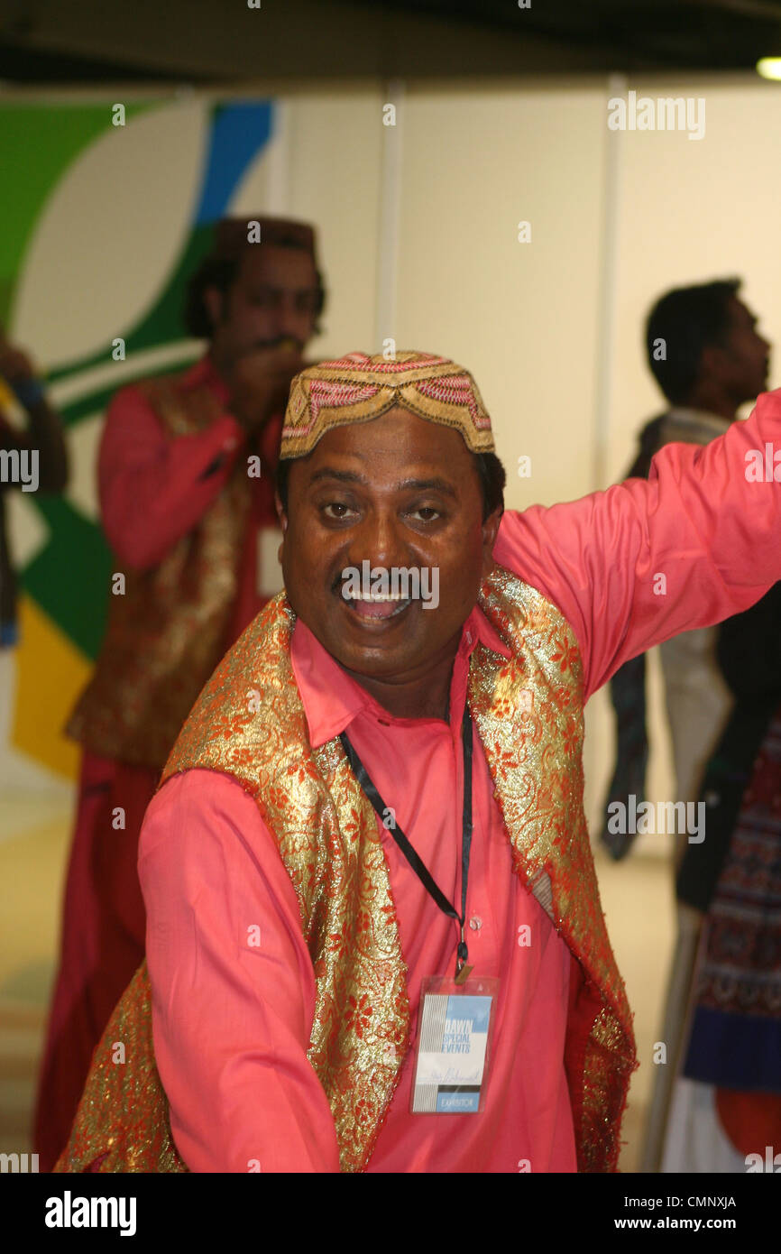 Sindhi man performs a traditional Pakistani dance at the first Dawn Pakistan Agri Expo in Karachi, Pakistan Stock Photo