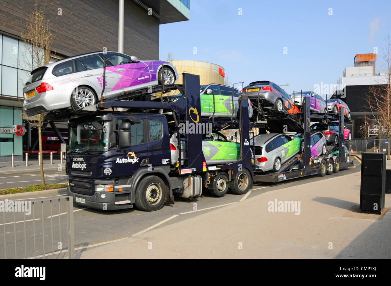Autologic Car Transporter BMW cars painted in 2012 Olympic Paralympic games colours for use by officials & others at Stratford East London England UK Stock Photo