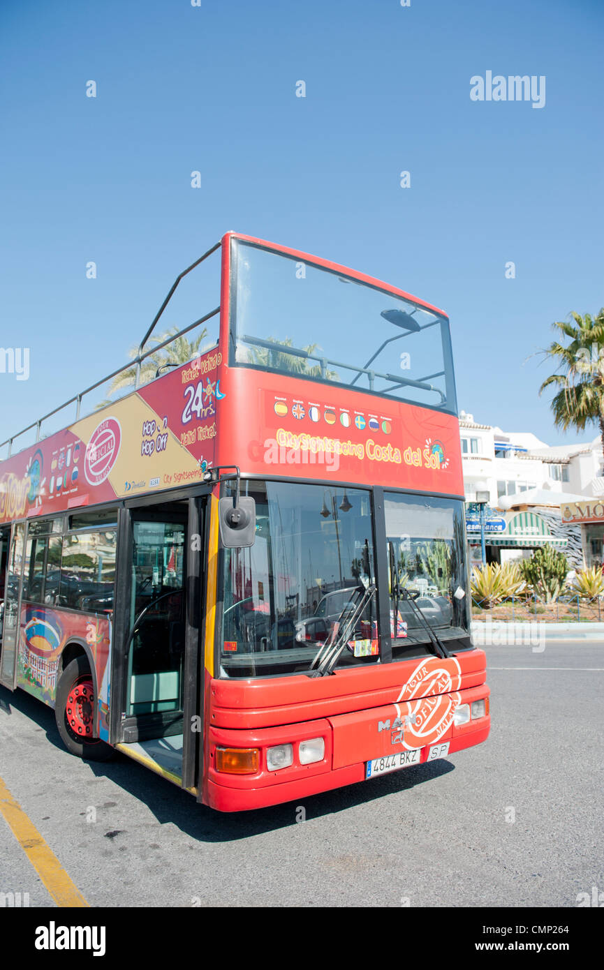 Open top tourist bus in the Costa Del Sol at Benalmadena in Spain Stock Photo