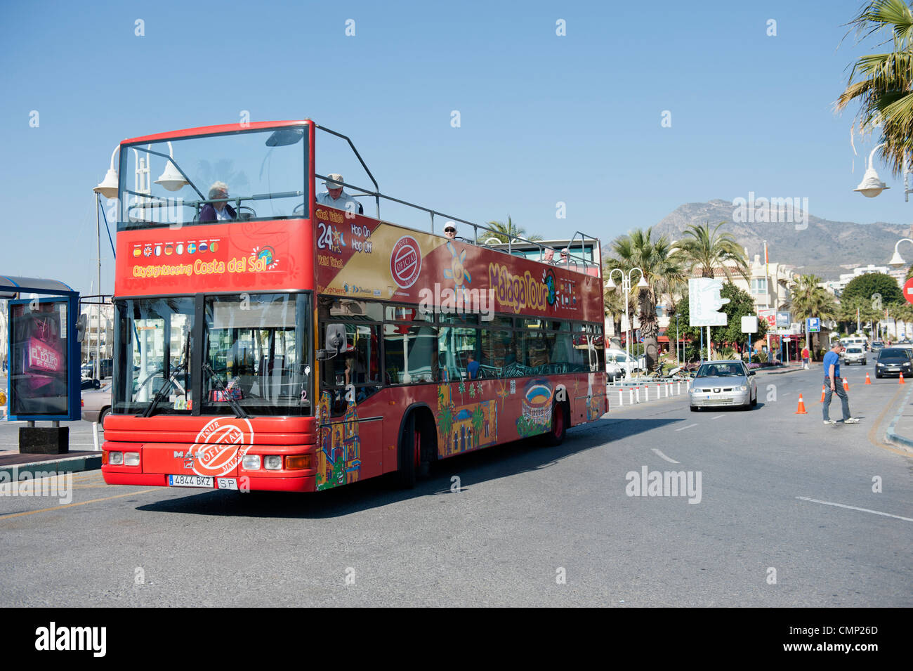 Open top tourist bus in the Costa Del Sol at Benalmadena in Spain Stock Photo