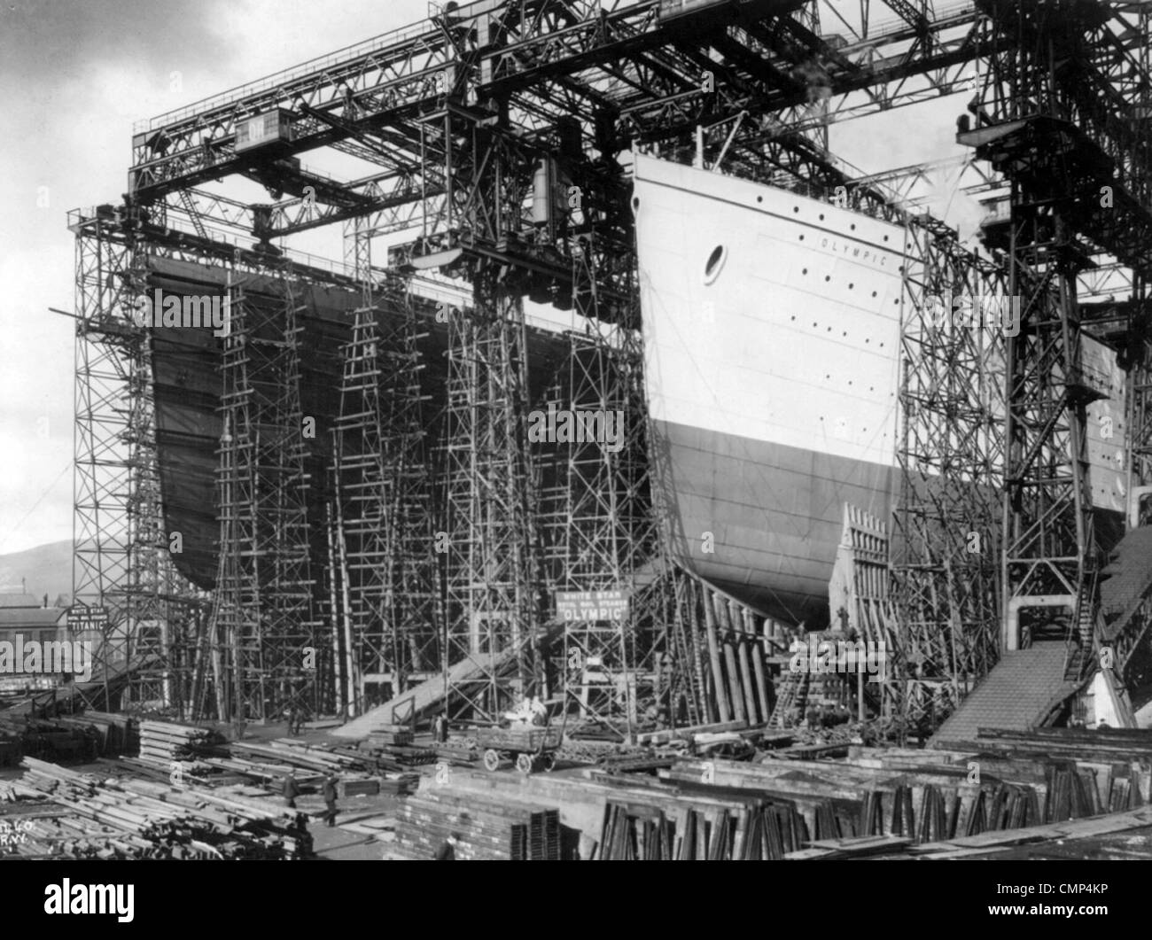 Olympic and Titanic view of bows in shipyard construction scaffolding in the Harland and Wolff shipyard in Belfast Stock Photo