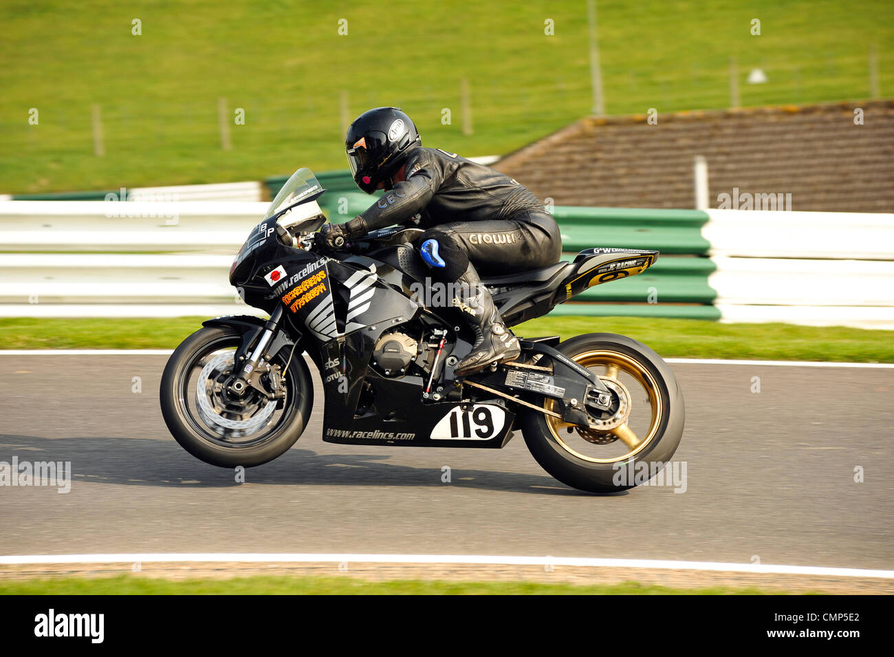 Motorcyclist on track, Cadwell Park. March 2012 Stock Photo