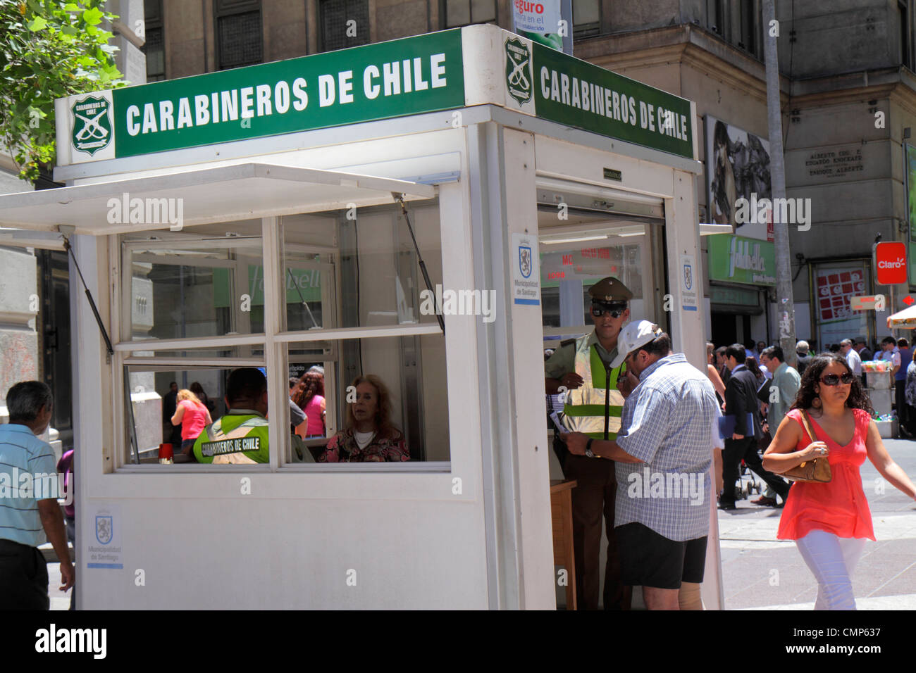 Santiago Chile,Paseo Ahumada,street scene,Carabiniers,Carabineros de Chile,national police,law enforcement,public safety,kiosk,Hispanic man men male,w Stock Photo