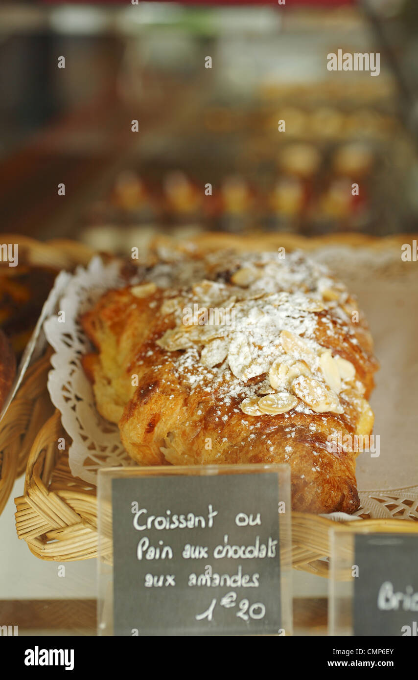 Chocolate croissant with almonds, France Stock Photo Alamy