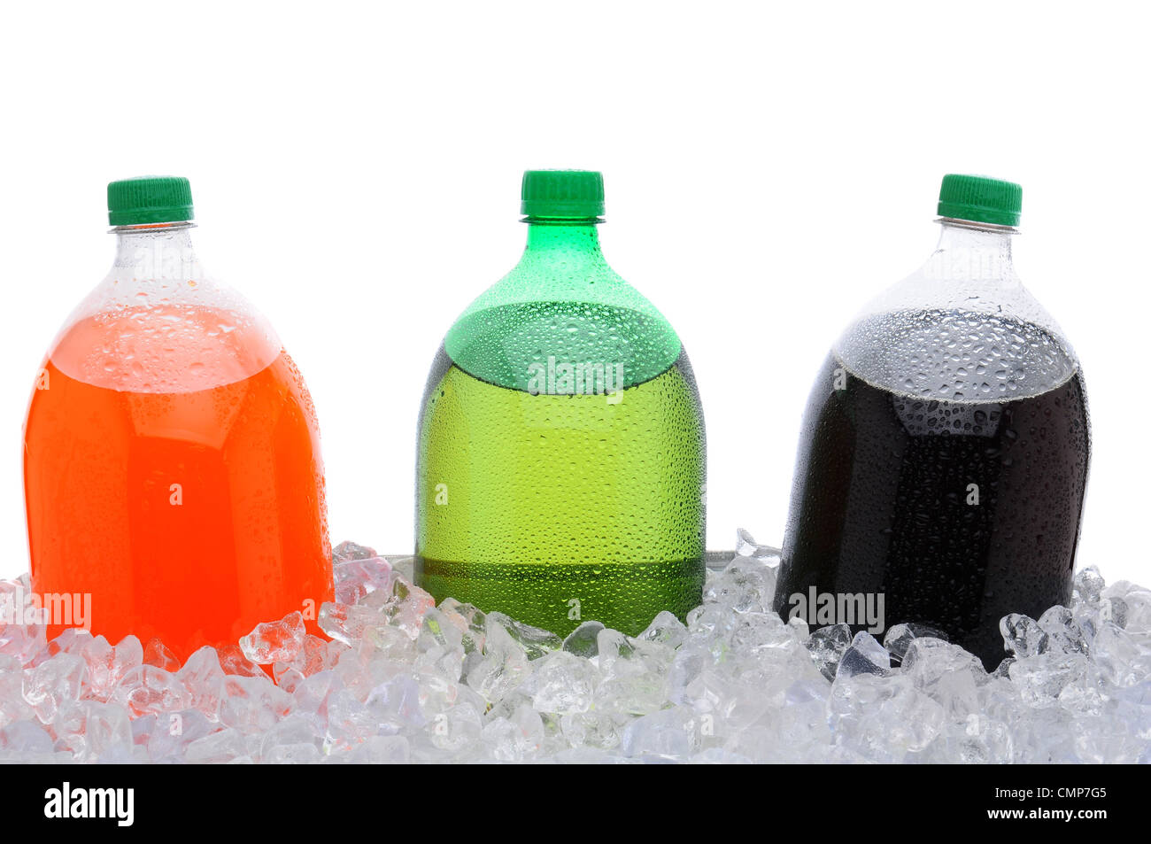Closeup of three, two liter soda bottles in a large party style ice