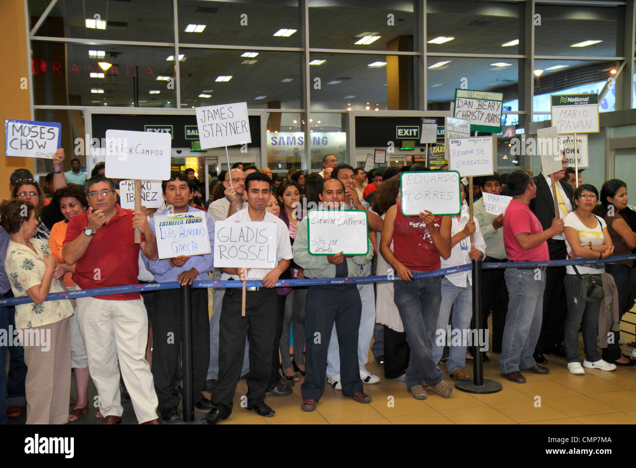Lima Peru,Jorge Chávez International Airport,LIM,passenger terminal,arrivals,chauffer,driver,name signs,Hispanic Latin Latino ethnic immigrant immigra Stock Photo