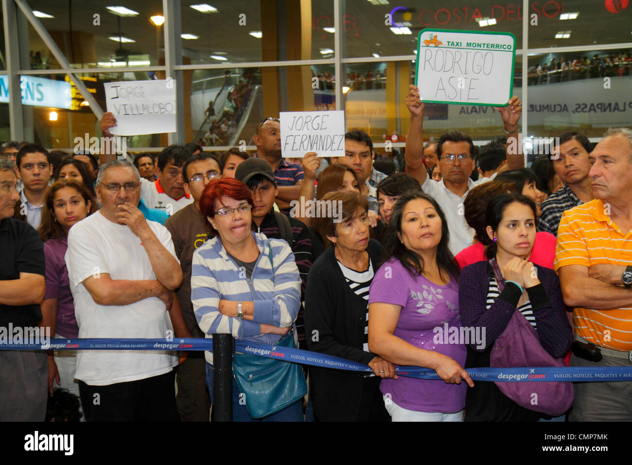 Lima Peru,Jorge Chávez International Airport,LIM,passenger terminal,arrivals,chauffer,driver,name signs,Hispanic Latin Latino ethnic immigrant immigra Stock Photo