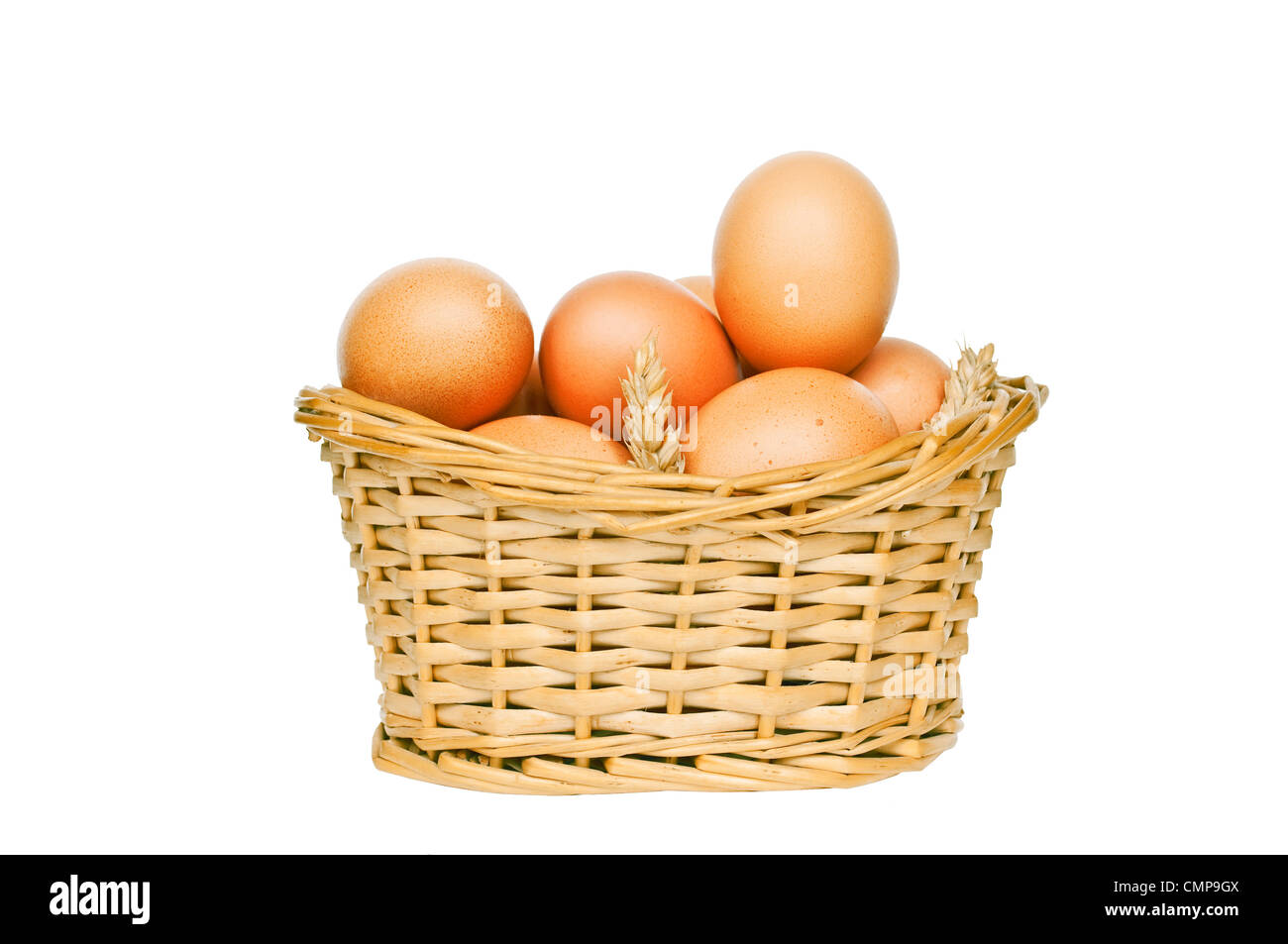 Eggs in wicker basket isolated on white Stock Photo - Alamy