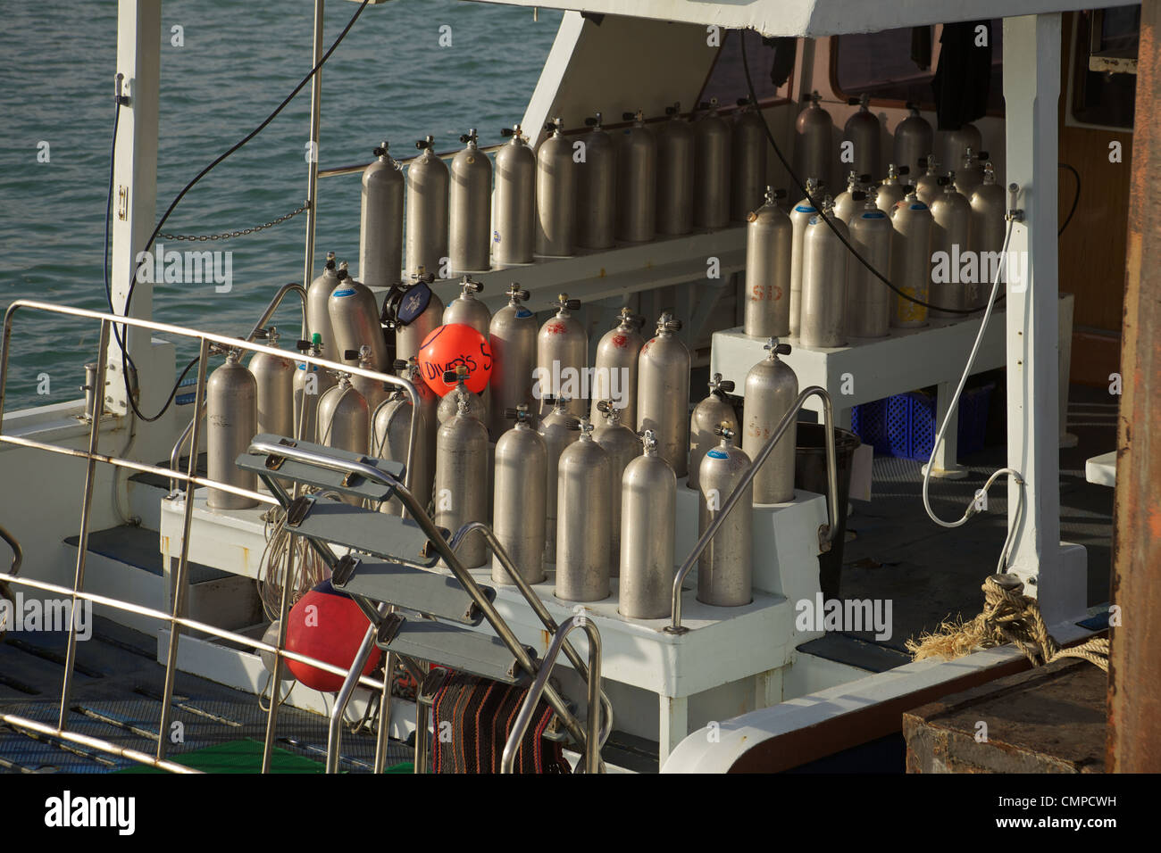 Oxygen cylinders on a dive boat, Chalong bay , Phuket , Thailand Stock
