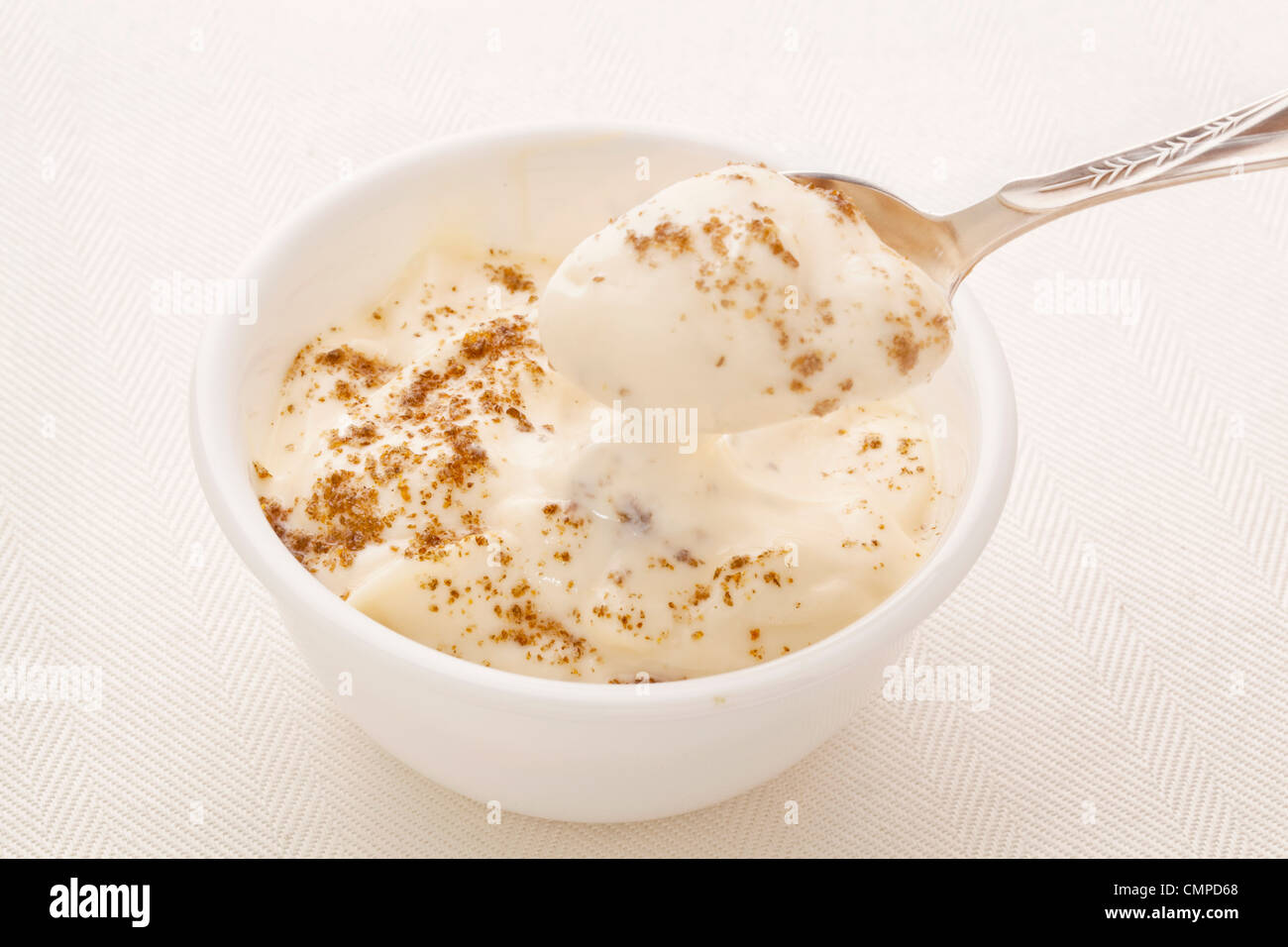 Greek style yogurt sprinkled with ground chia seeds - healthy breakfast concept Stock Photo