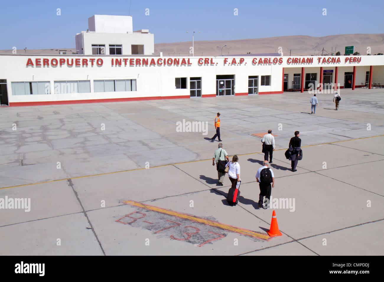 Tacna Peru,Aeropuerto Internacional Carlos Ciriani,airport,aviation,terminal building,LAN flight from Lima,arrival,tarmac,Hispanic man men male,woman Stock Photo