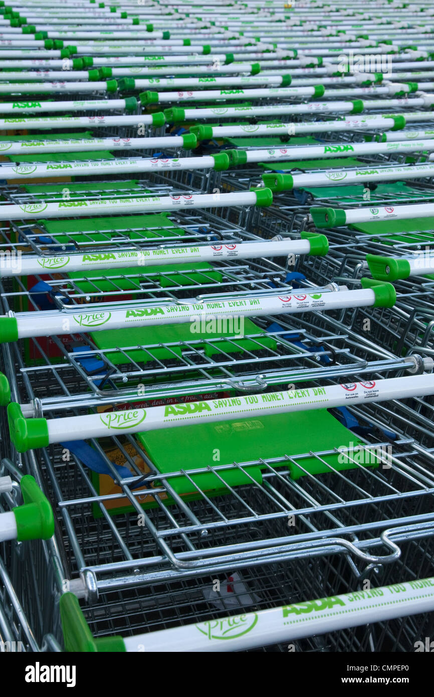 Supermarket trolleys outside Asda store Stock Photo