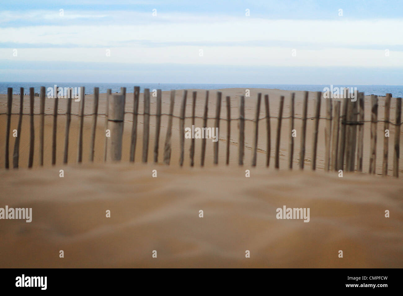 Wooden fence on the beach of Calais Stock Photo - Alamy