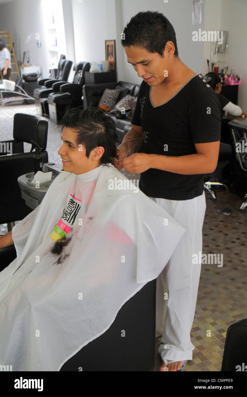 Tacna Peru,Avenida 2 de Mayo,Hispanic man men male adult adults,customer,hairdresser,barber,haircut,beauty salon,personal grooming,Peru120120057 Stock Photo