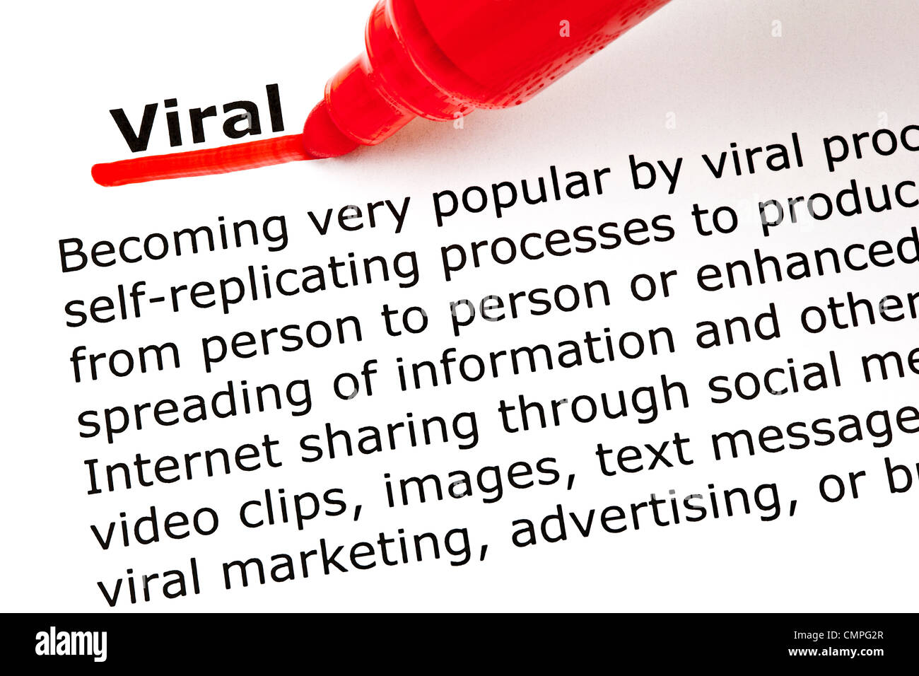The word Viral underlined with red marker on white paper Stock Photo
