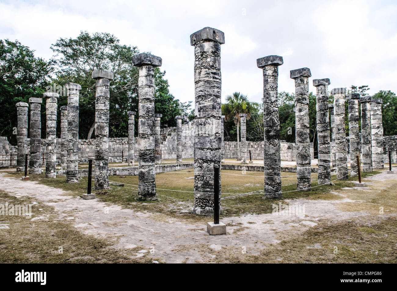 CHICHEN ITZA, Mexico - Rows of stone pillars line the Plaza of the Thousand Columns at Chichen Itza Mayan ruins archeological zone in the heart of Mexico's Yucatan Peninsula. Stock Photo