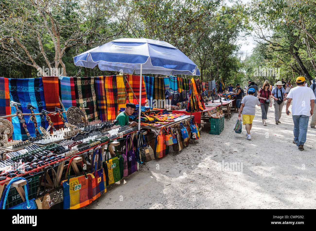 CHICHEN ITZA, Mexico - Market stalls selling local souvenirs and handicrafts to tourists visiting Chichen Itza Mayan ruins archeological site in Yucatan, Mexico. Stock Photo