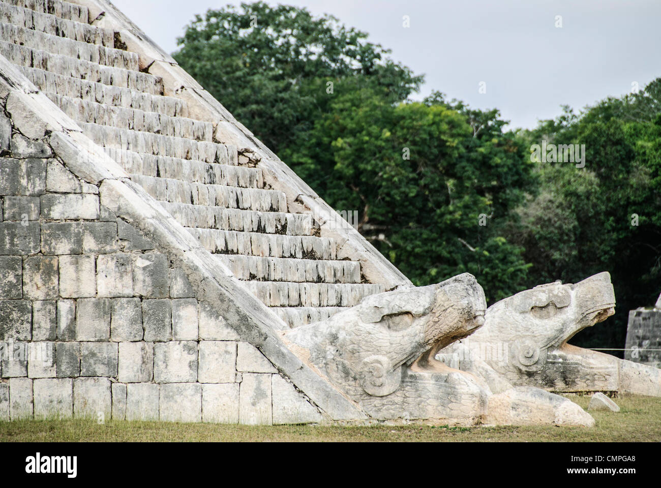 CHICHEN ITZA, Mexico - Bottom of the stairs of Temple of Kukulkan (El Castillo) at Chichen Itza Archeological Zone, ruins of a major Maya civilization city in the heart of Mexico's Yucatan Peninsula. Stock Photo
