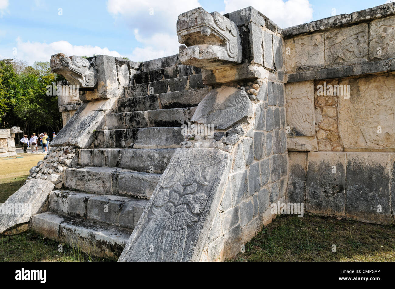 CHICHEN ITZA, Mexico - Stone stairs leading to the top of a ceremonial platform, with carved jaguar heads guarding either side, at Chichen Itza Archological Zone, Yucatan, Mexico. Stock Photo