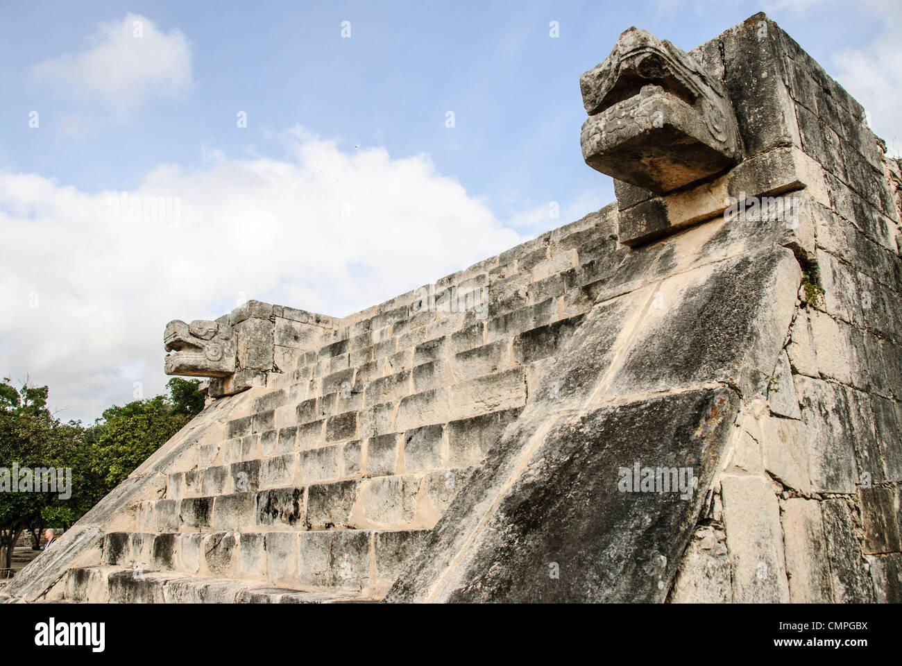 CHICHEN ITZA, Mexico - Stone stairs at Chichen Itza with jaguar heads on either side. The Jaguar is a recurring symbol in Mayan culture. Stock Photo