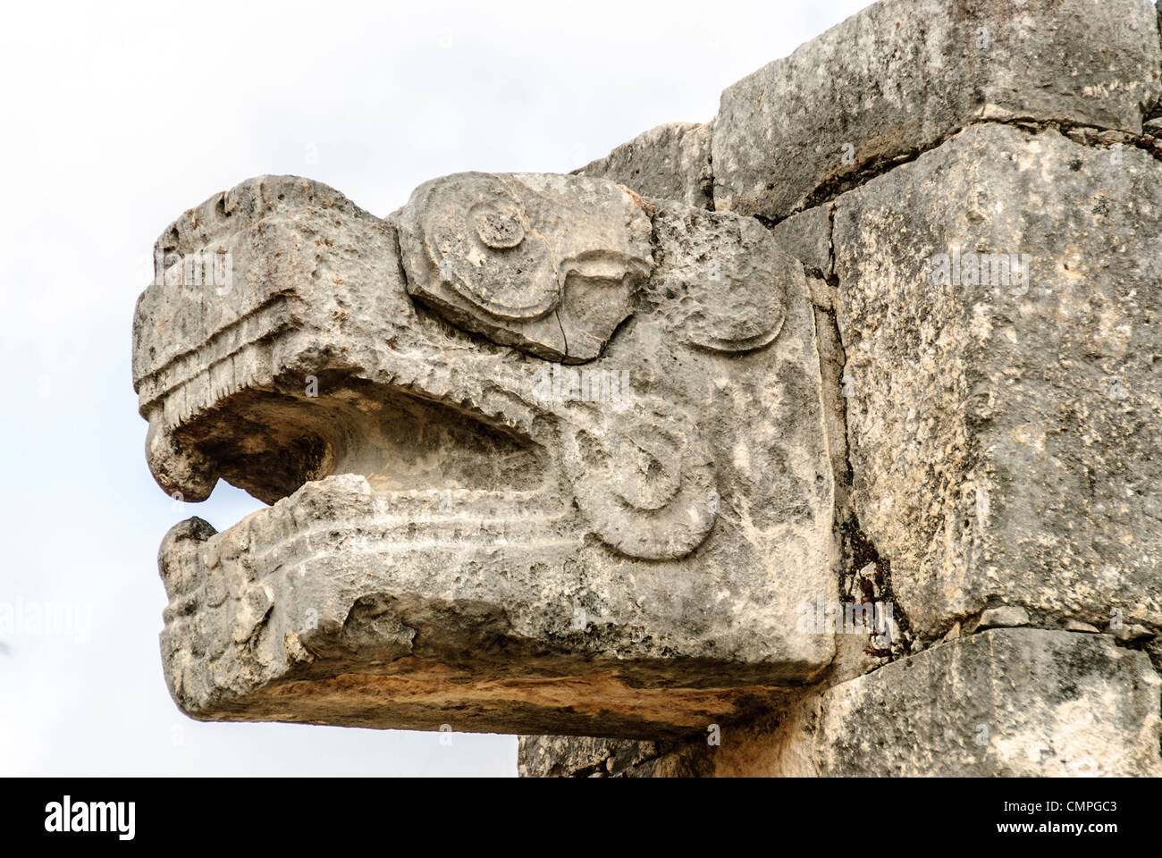 CHICHEN ITZA, Mexico - Carved stone jaguar heads adorning the buildings at Chichen Itza, Mexico. Stock Photo