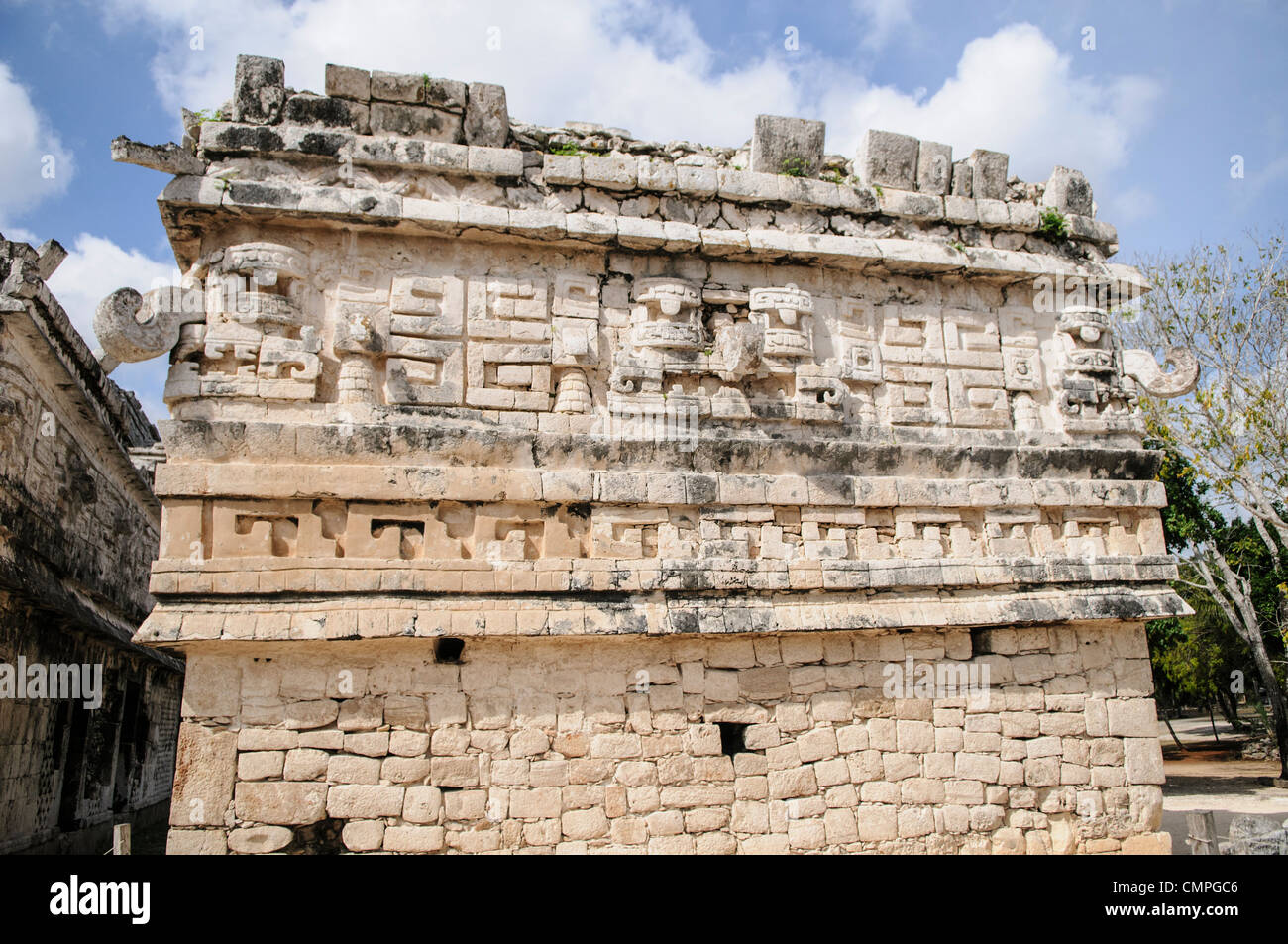 CHICHEN ITZA, Mexico - Ornately decorated building at Chichen Itza Mayan ruins in Mexico. This is the side of 'La Iglesia' in the Las Monjas complex of buildings on the site. Stock Photo